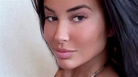 NFL Wag and OnlyFans model Rachel Bush wows in barely-there bikini after fans label her ...