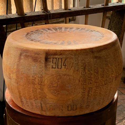 Parmigiano Reggiano Auctions 21-Year-Old Cheese Wheel at the World ...