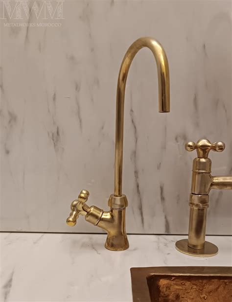 Aged Brass Kitchen Faucet With Gooseneck Spout