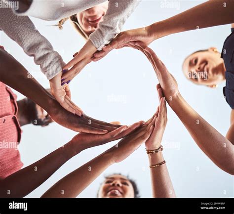 Diversity, teamwork and hands in circle synergy of employee workers ...