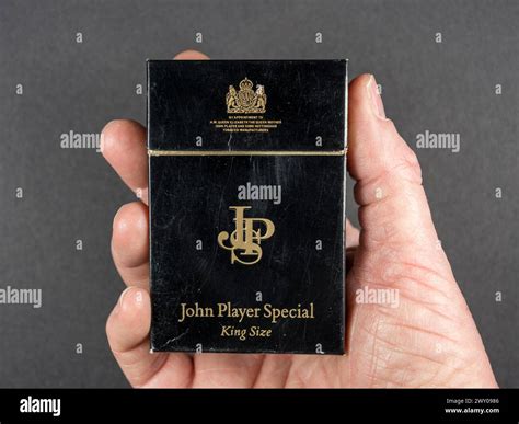 Man holding an original empty packet of 20 John Player Special (JPS ...