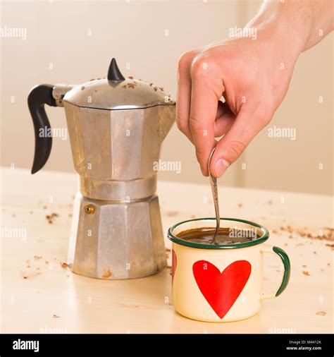 Coffee in Italian style on a wooden table Stock Photo - Alamy