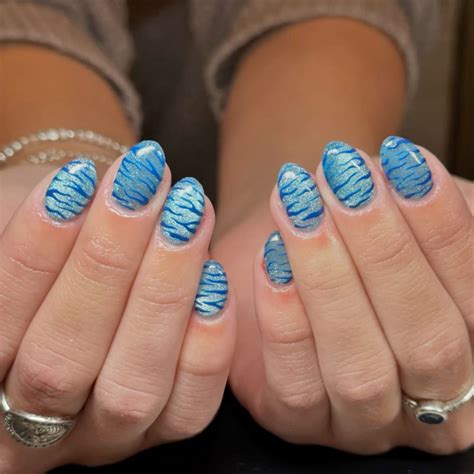 Blue cat eye | Girly acrylic nails, Cute acrylic nails, Zebra nails