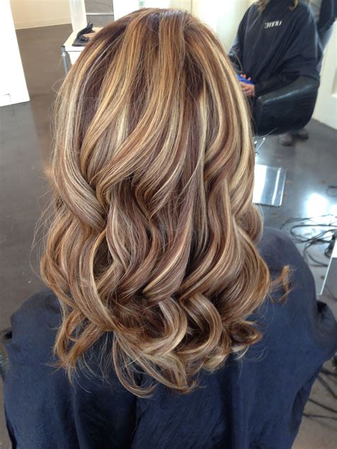 Warm chocolate brown base with golden blonde highlights. # ...