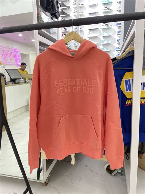 Fear Of God Essentials Ss22 Coral Hoodie | AfterMarket