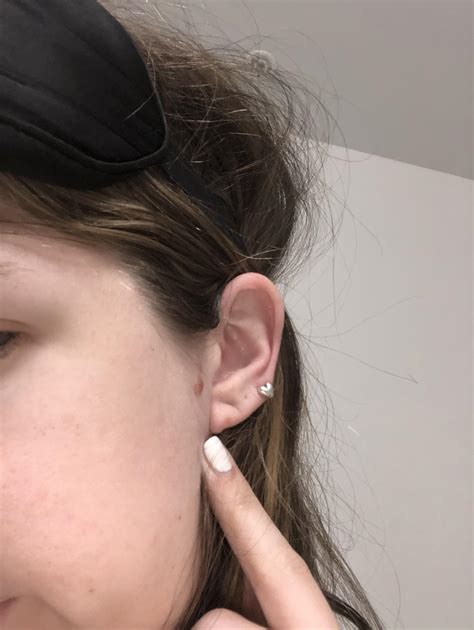 Is my third lobe piercing too low? Obviously my lobes are thin but the ...