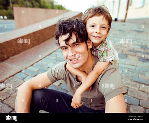 little son with father in city Stock Photo - Alamy
