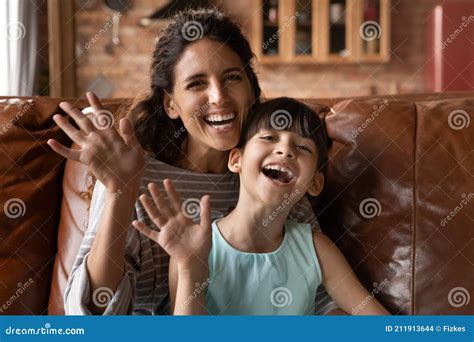 Portrait of Happy Latino Mom and Daughter Talk on Webcam Stock Photo ...