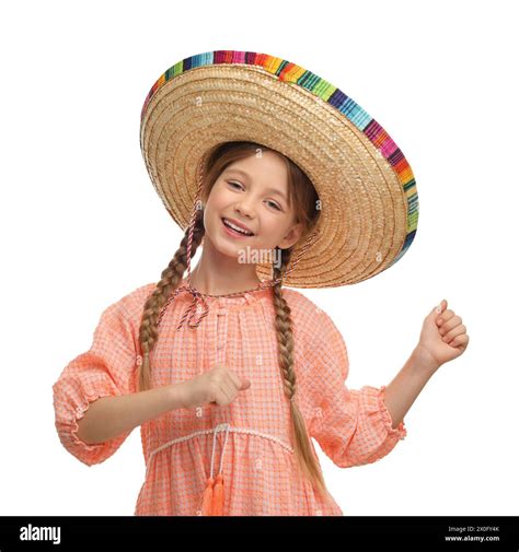 Cute girl in Mexican sombrero hat dancing on white background Stock ...