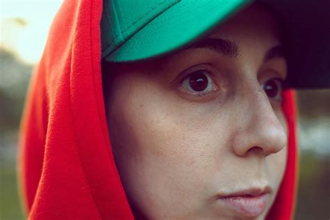 Face of Woman in Cap and Hood · Free Stock Photo