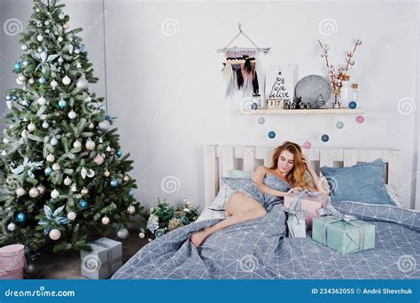 Naked blonde model on bed stock image. Image of lips - 234362055