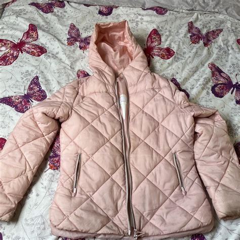 Pink Calvin Klein ladies golf coat, worn a lot but... - Depop