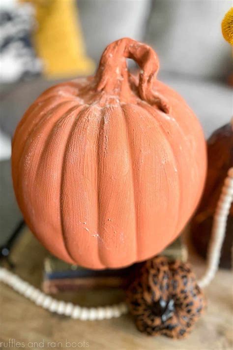 Easy DIY Terra Cotta Pumpkins - Ruffles and Rain Boots