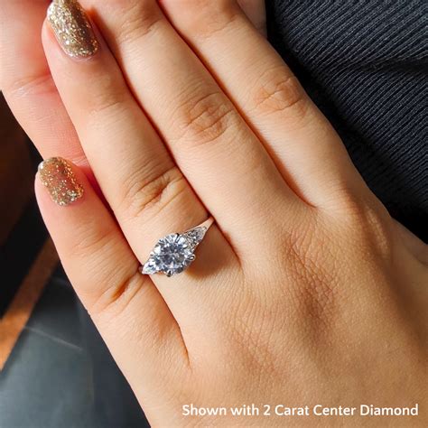 Round Cut Engagement Rings On Finger