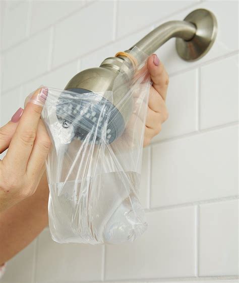 Here's How to Clean a Showerhead Using Ingredients You Have in Your ...