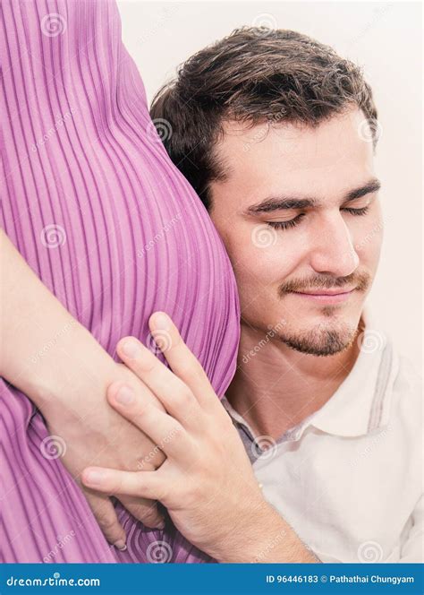 Happy Expectant Father Listening To Hear the Baby Stock Image - Image ...