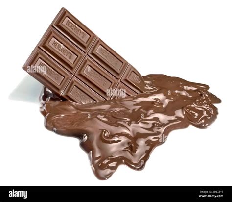 Half-melted bar of Hershey's chocolate photographed on a white ...