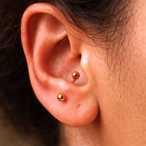 Anti-Tragus Piercing Guide: Pain, Healing, Jewelry & Aftercare ...