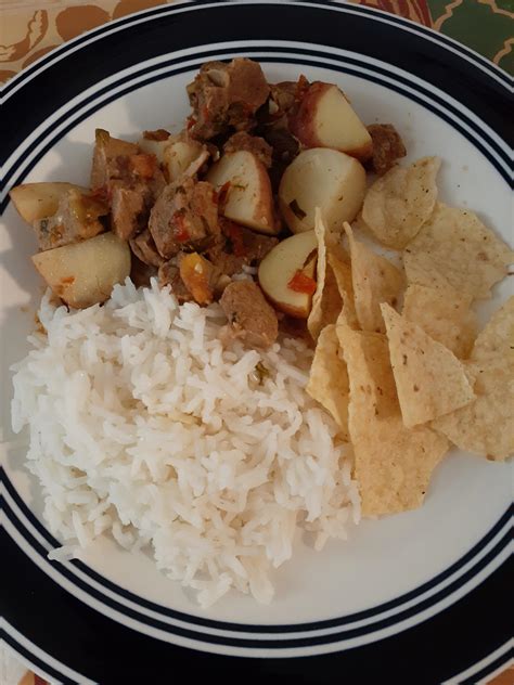 Beef stew (235 calories) with rice (100 calories) and chips (75 ...