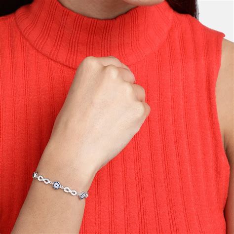 Eternal Elegance Cubic Sparkle Zirconia Rhodium-Plated Infinity Bracel – Zavya