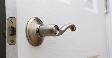 Unlocking door knob with hole - Door Knobs