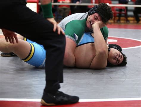 Region 6 wrestling quarterfinals at Jackson Liberty High School ...