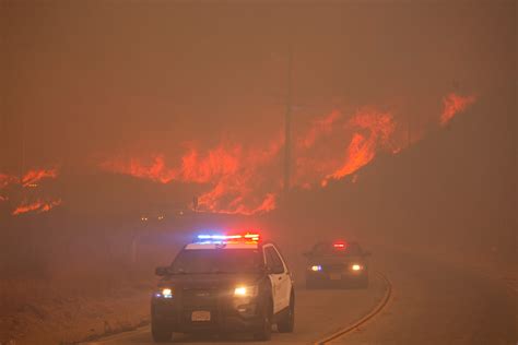 In photos: New wildfire explodes near Los Angeles, forces evacuations ...