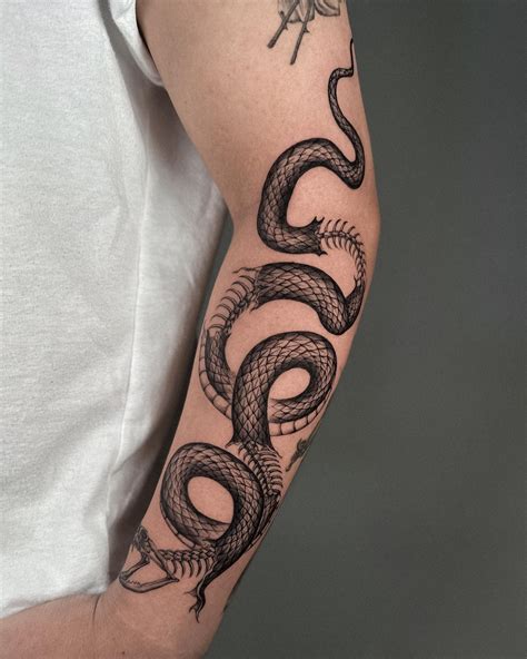 Snake Tattoo Meaning On A Man at Lisa Cunningham blog