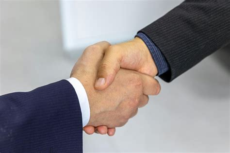 Two People Shaking Hands Photos, Download The BEST Free Two People ...