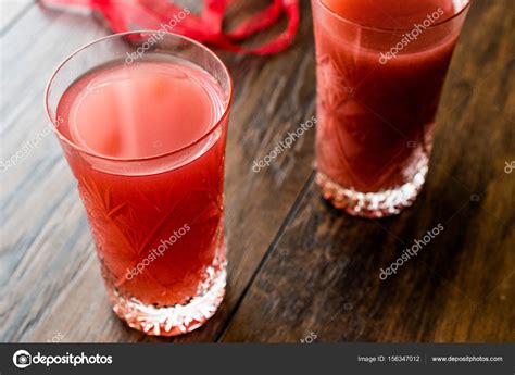 Kizilcik serbeti / Cranberry Sherbet on dark wooden surface. Stock ...