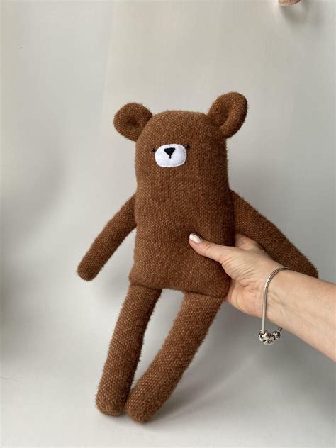 Sewing pattern for a teddy bear made of knitwear with a master class on sewing