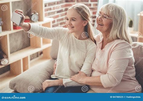 Granny and granddaughter stock image. Image of lifestyle - 84788525