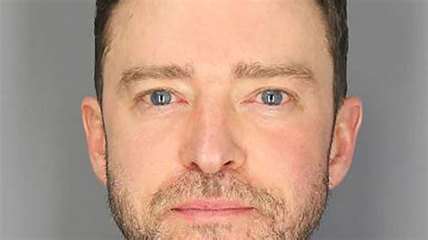 Justin Timberlake's glassy eyed mugshot released by cops after DWI ...