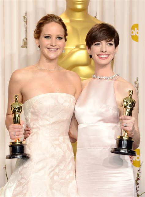 Jennifer Lawrence and Anne Hathaway celebrate Oscar night by swapping boyfriends. | Scrolller