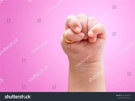 Стоковая фотография 1810038379: Close Infant Hand Clenched Fist Trisomy ...