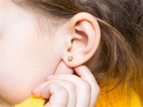 Do Ear Lobe Piercings Hurt - Blog | Pretty N' Ink, LLC