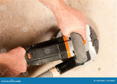 Sanding the cement floor stock photo. Image of house - 15874648