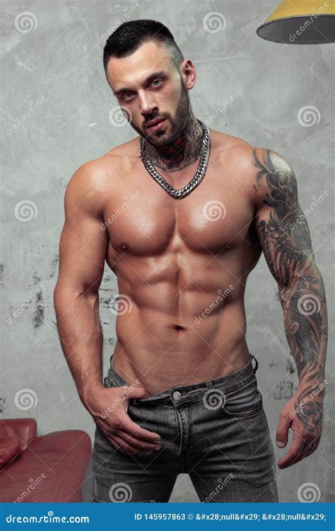 Fashion Portrait of Naked Male Model with Tattoo and a Black Beard ...