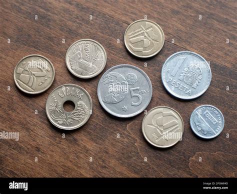 Coin money of Spain on wooden background, close up. Euro coins. Spanish ...