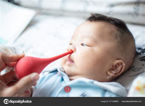 Bulb Syringe And Baby