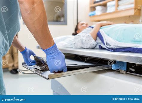 Nurse Preparing for Xray in Examination Room Stock Image - Image of ...