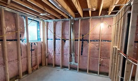 Comparison of Framing Methods: Steel Tracks + 2x4 Studs + Blocking ...