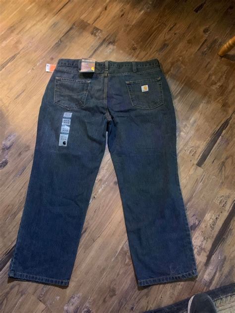 Carhartt jeans with the tags still on. Nobody in my life is this size ...