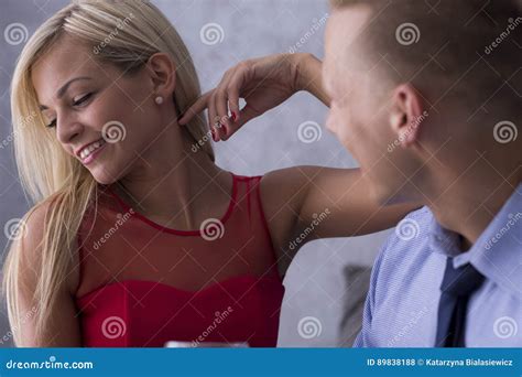 Young woman seducing man stock photo. Image of elegant - 89838188