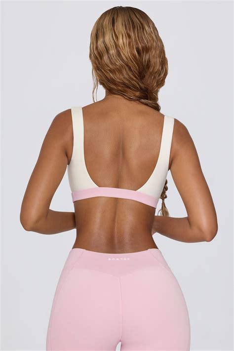Contrast Sports Bra in Pale Pink Marl | Oh Polly