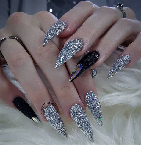 Fierce custom long black and silver glitter stiletto nails | Stiletto ...