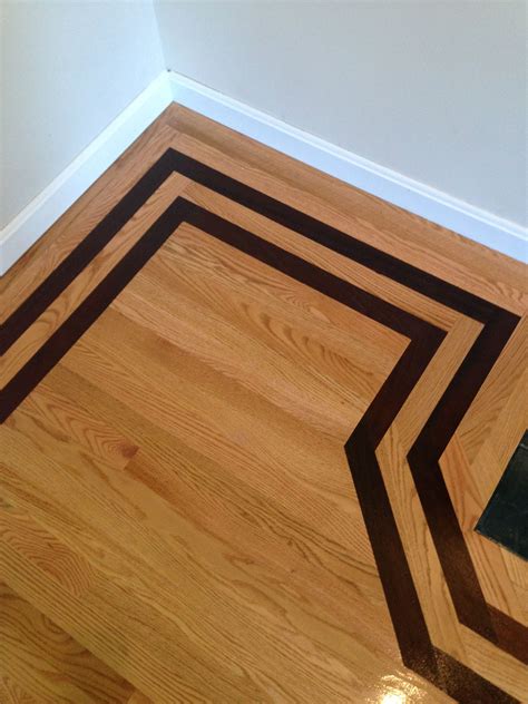 Wood inlay floor in our family room. | Wood floors, Wood floor design ...