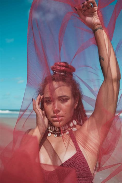 Young Woman Posing in a Bikini and Shirt on the Beach · Free Stock Photo