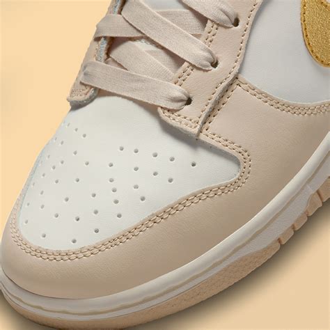Nike Dunk Low "Gold Swoosh" DX5930-001 | SneakerNews.com
