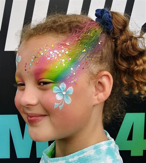 Pin by Mary-Ellen Thomas on Rainbow | Festival face paint, Face ...